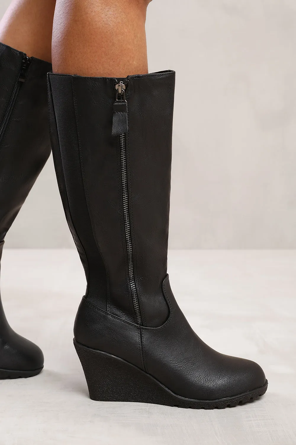 LARA WEDGE HEEL MID CALF HIGH BOOTS WITH SIDE ZIP IN BLACK FAUX LEATHER