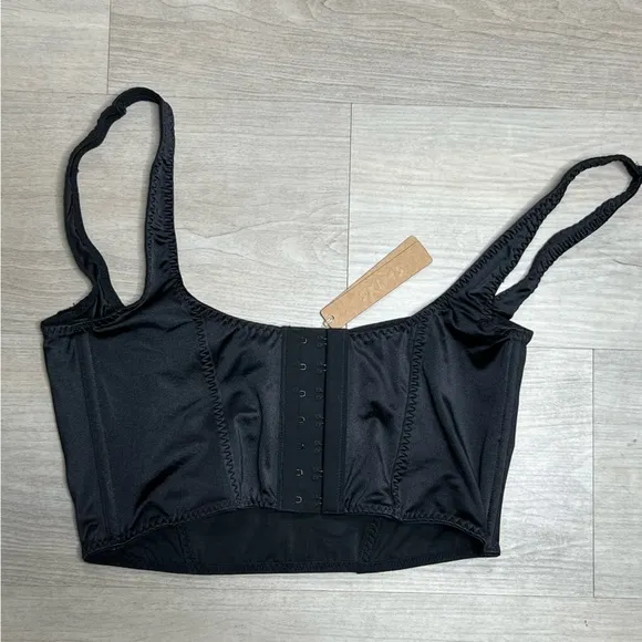 SKIMS stretch satin corset in Onyx/ Black, size M NWT