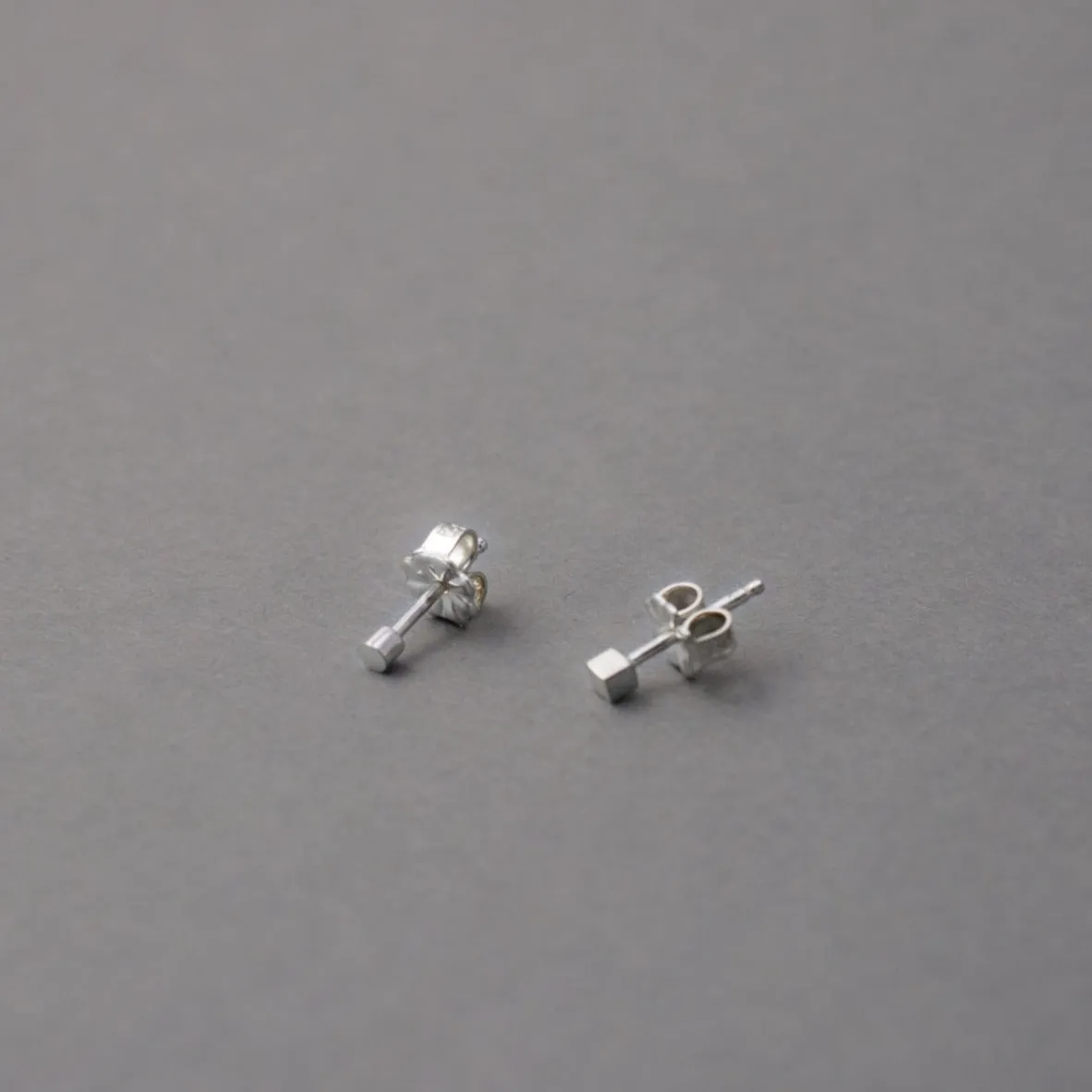 STARDUST CIRCLE AND SQUARE STUDS
